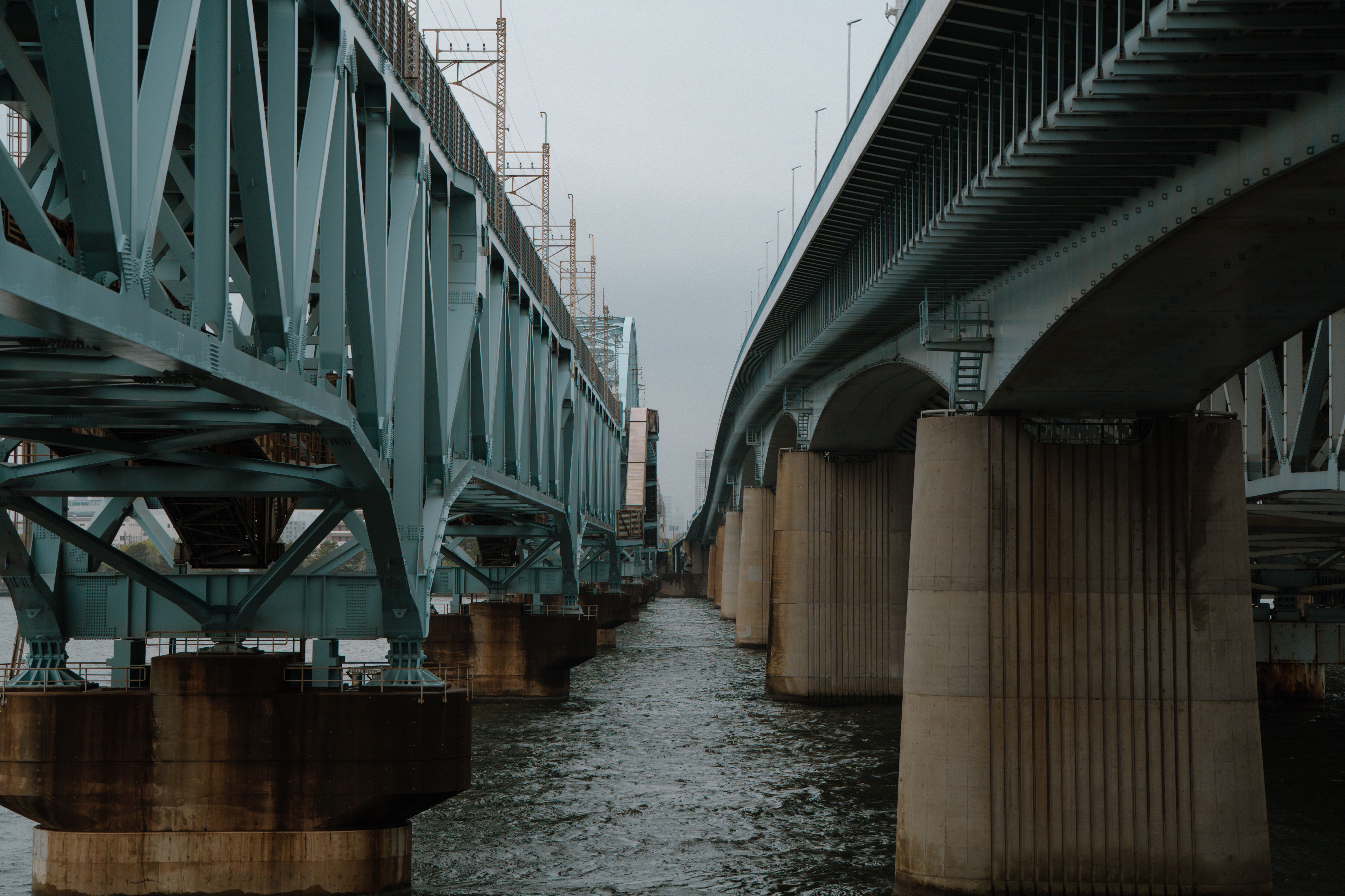 Modern bridge spanning a Tokyo waterway as a symbol of regional infrastructure