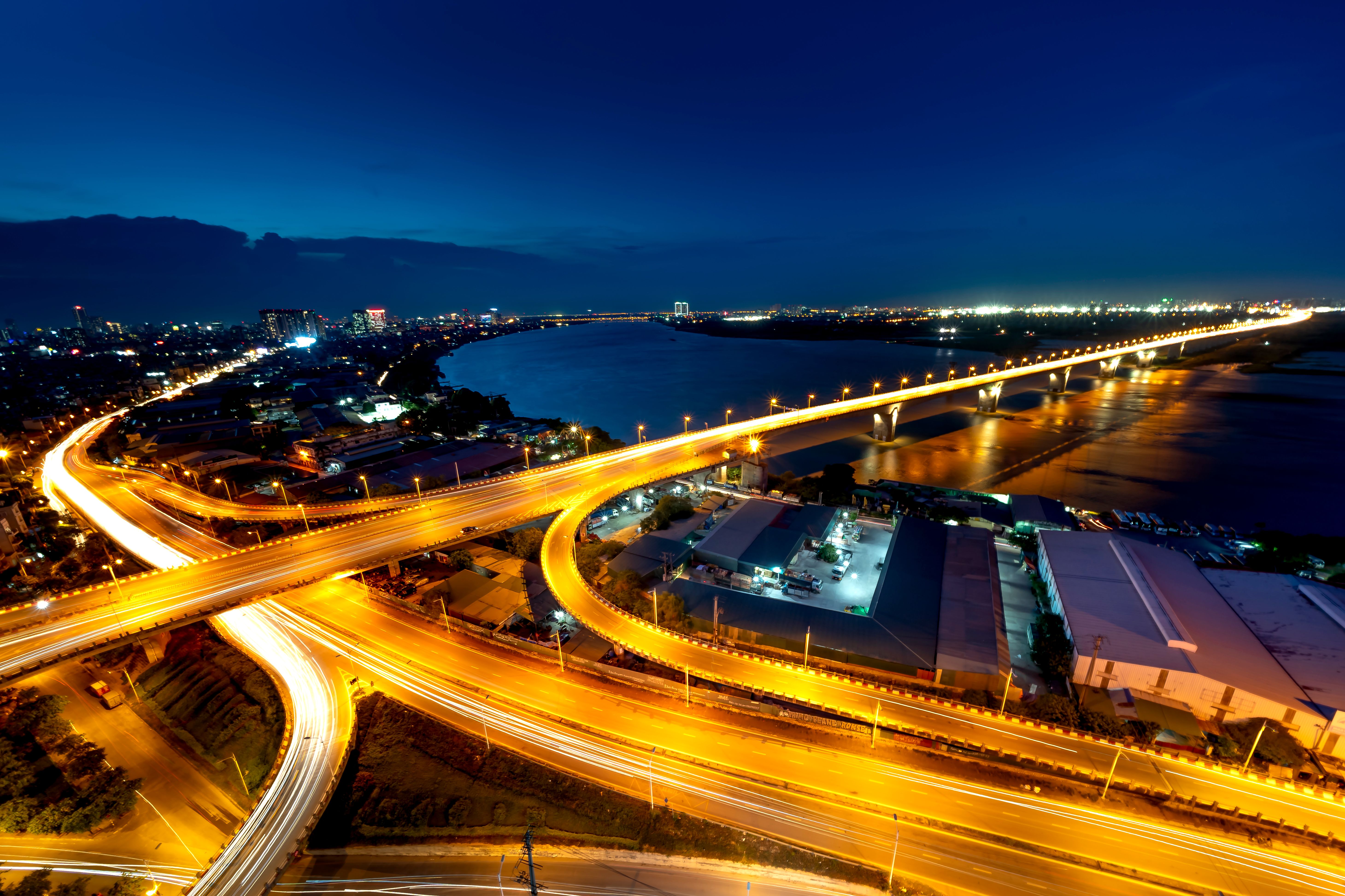 Illuminated highways and bridges connecting Hanoi at night